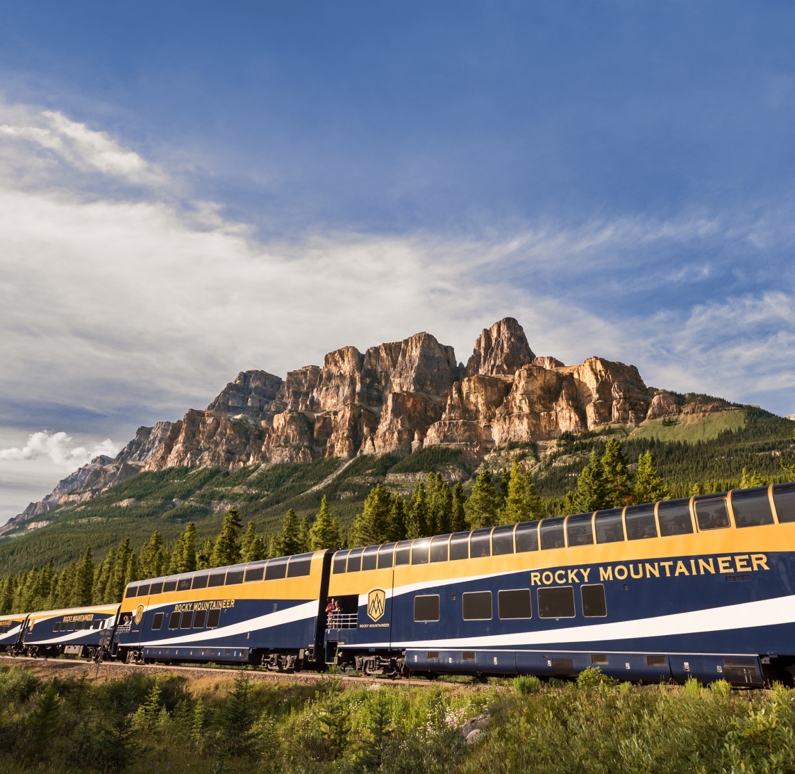 Rocky Mountaineer runs along Castle Mountain Canada