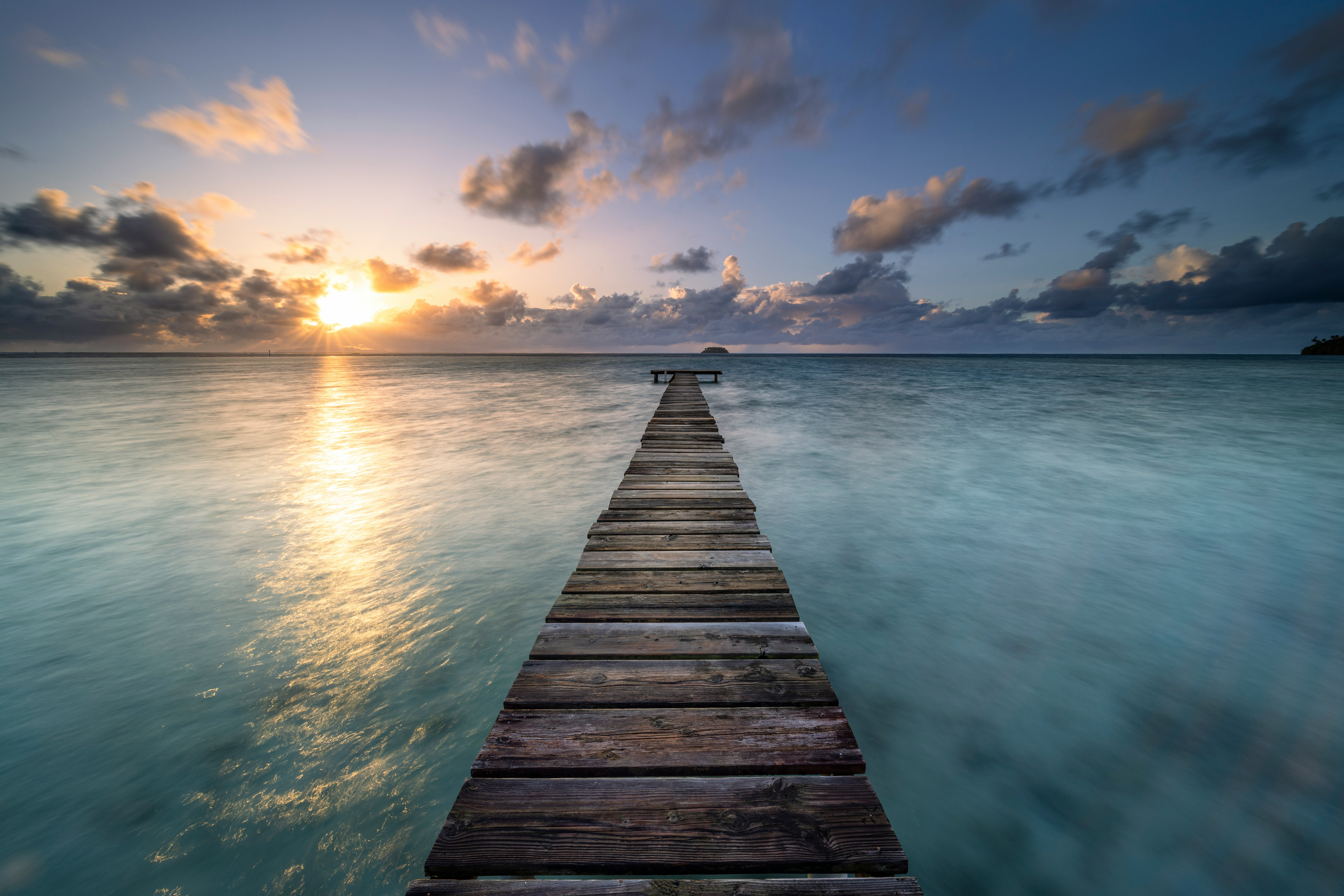 A wooden pier in the ocean of Raiatea