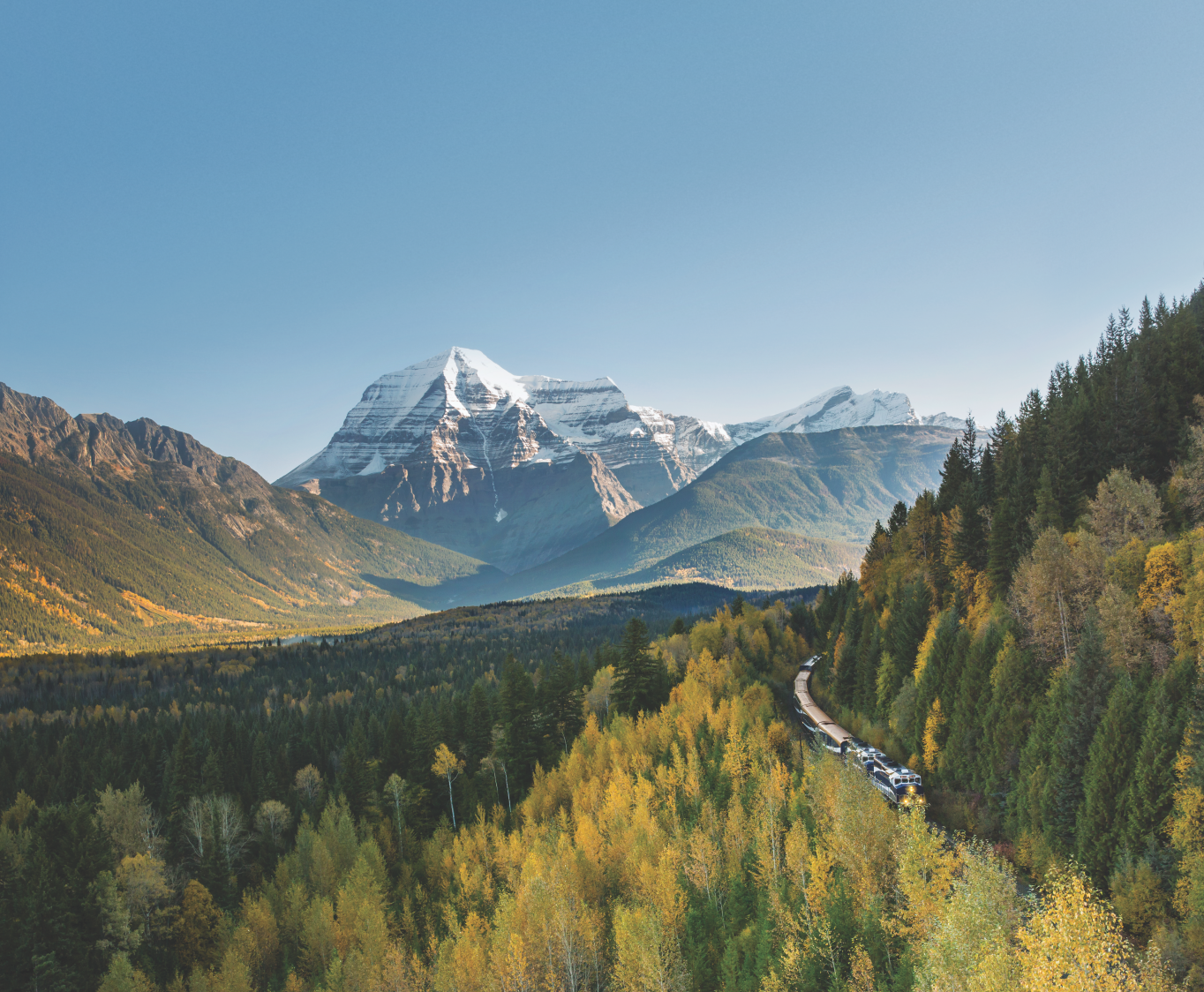 Rocky Mountaineer Canadian Rockies rail journey Mt. Robson in the background